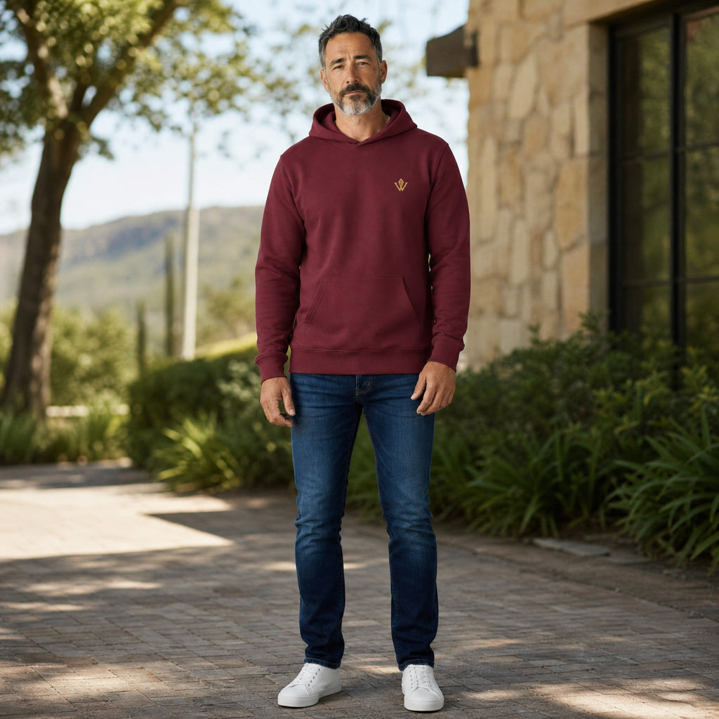 VVID Essential Hoodie in maroon cotton with a gold emblem on the chest and a front pocket.