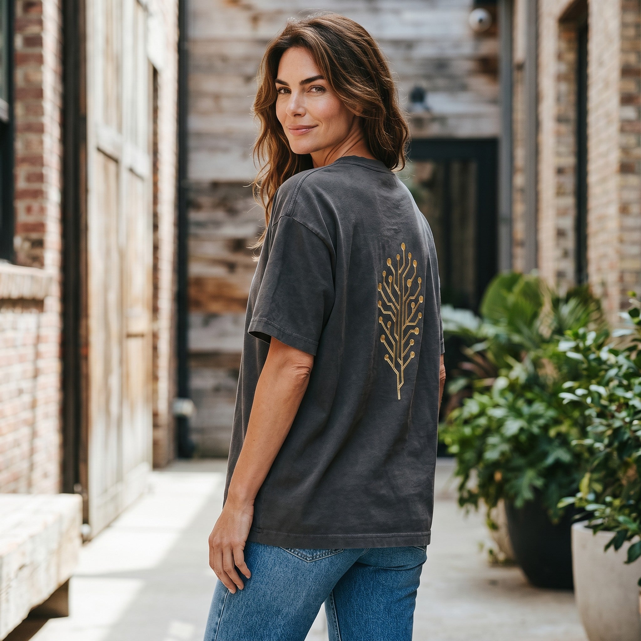 VVID Essentials charcoal grey oversized t-shirt with a gold circuit board tree graphic on the back.