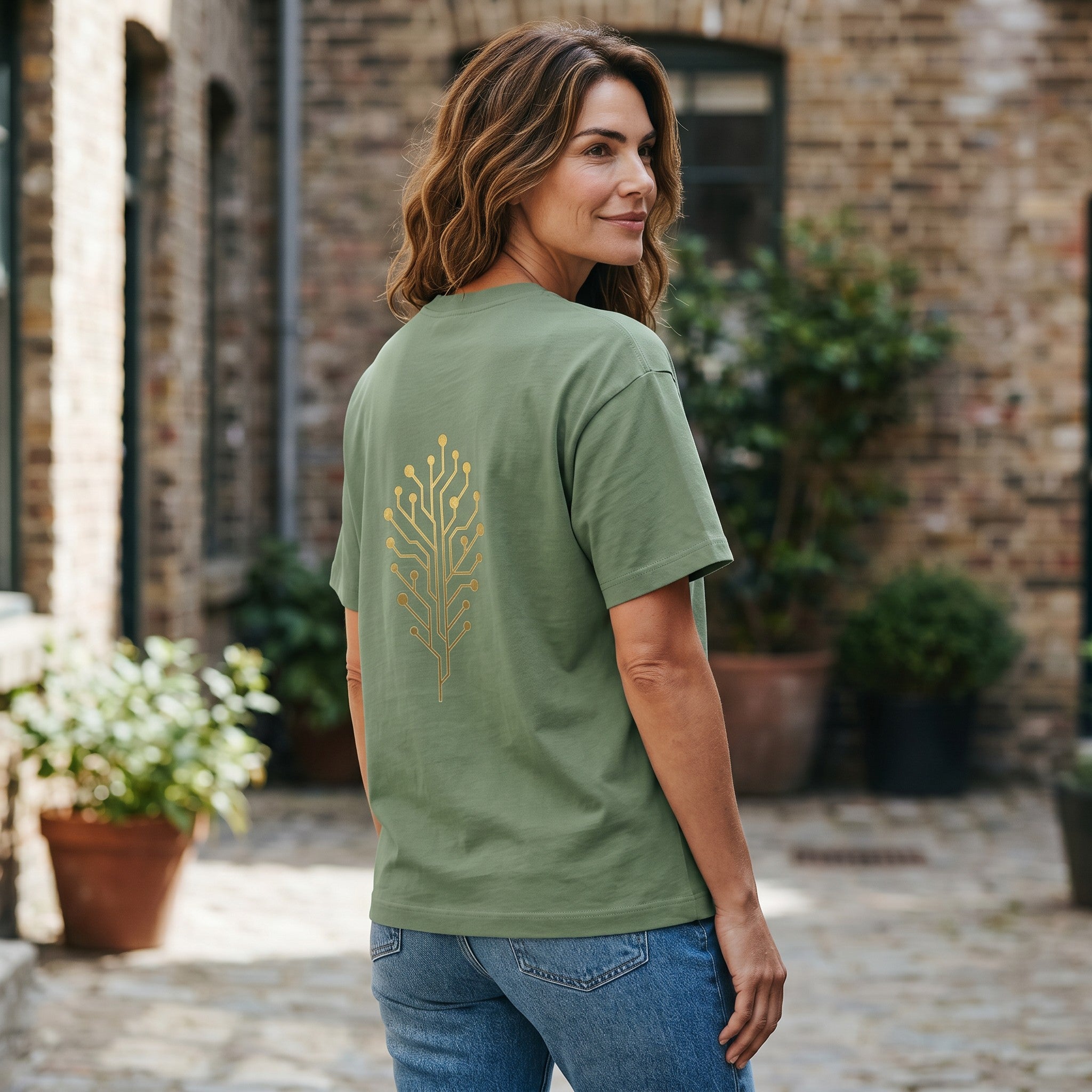 VVID - Indian Artisan Luxury Fashion House olive green oversized t-shirt with a gold circuit board tree graphic on the back.