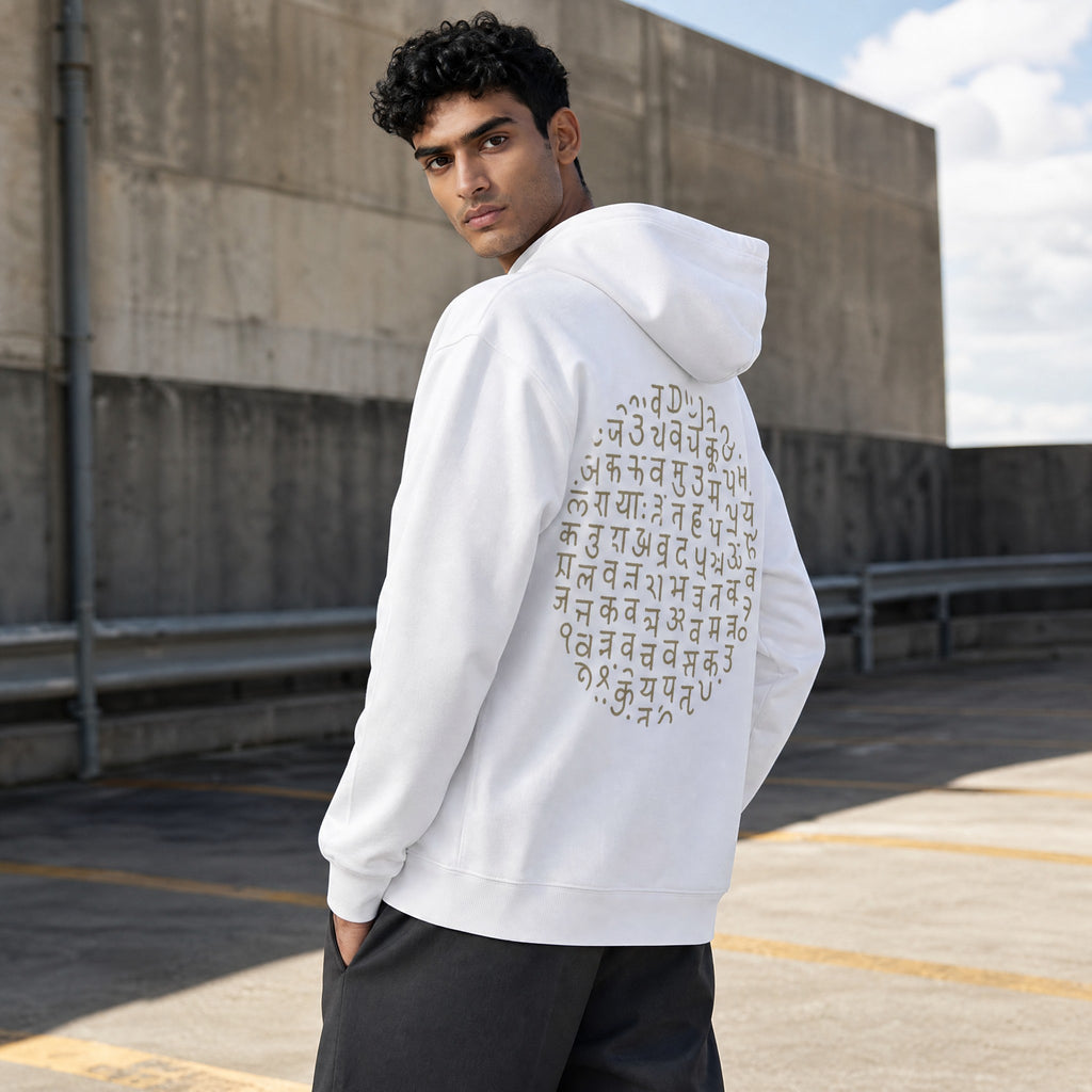 VVID - Indian Artisan Luxury Fashion House white cotton-polyester blend hoodie with gold Sanskrit mandala graphic on back.